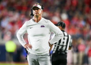Mississippi Rebels head coach Lane Kiffin stands on the sideline during the first quarter against the Florida Gators at Vaught-Hemingway Stadium.