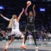 New York Liberty center Jonquel Jones (35) shoots past Phoenix Mercury forward Satou Sabally (0) during the 2025 WNBA Playoffs.