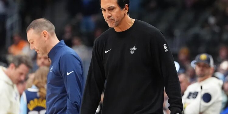 Miami Heat head coach Erik Spoelstra, front, heads to the locker room after a loss to the Denver Nuggets at Ball Arena on Wednesday, November 5, 2025, in Denver.