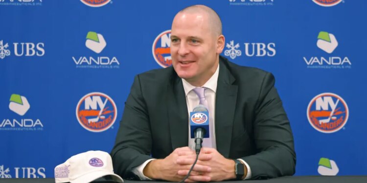 New York Islanders GM Mathieu Darche speaking at a press conference.