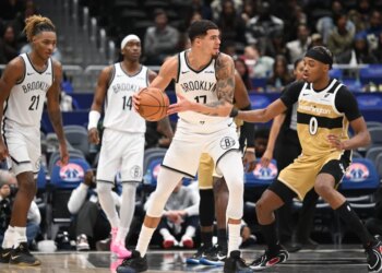 Brooklyn Nets forward Michael Porter Jr. (17) looks to pass the ball in front of Washington Wizards guard Bilal Coulibaly (0) during the third quarter at Capital One Arena.