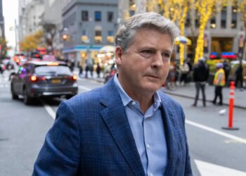 Hal Steinbrenner leaving the MLB owner's meeting.