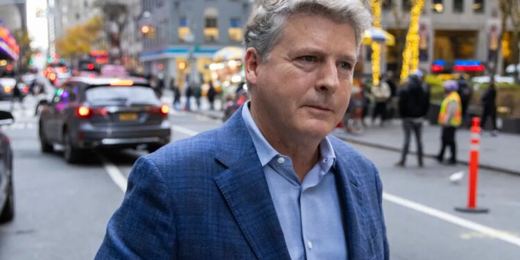 Hal Steinbrenner leaving the MLB owner's meeting.