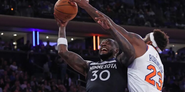 Mitchell Robinson looks to block Julius Randle's shot during the third quarter of the Knicks' blowout home win over the Timberwolves.