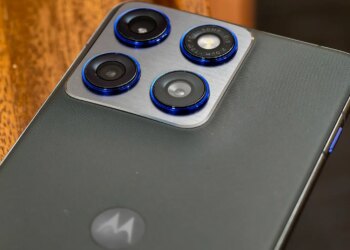 Photo of Motorola Edge 70 lying on a wooden table showing the cameras