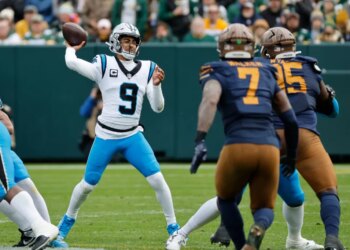 Carolina Panthers quarterback Bryce Young (9) throws a pass against the Green Bay Packers.