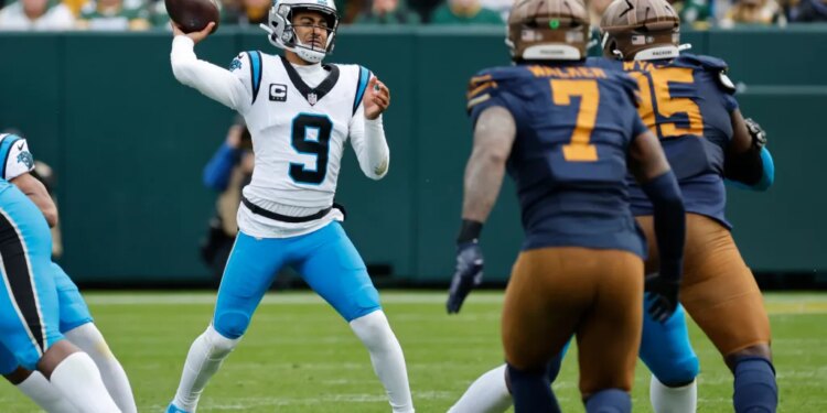 Carolina Panthers quarterback Bryce Young (9) throws a pass against the Green Bay Packers.