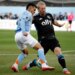 New York City forward Alonso Martínez, left, and Charlotte FC defender Tim Ream compete for the ball during the first half of Game 2 in the first round of MLS soccer's Eastern Conference playoffs, Saturday, Nov. 1, 2025
