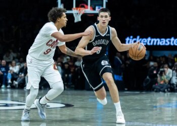 Brooklyn Nets guard Egor Demin (8) drives around Cleveland Cavaliers guard Craig Porter Jr. (9) in the second half at Barclays Center, Friday, Oct. 24, 2025, in Brooklyn, NY.