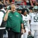 Ohio Bobcats head coach Brian Smith on the sideline during a football game.