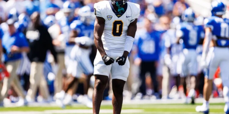 Toledo Rockets defensive back Nasir Bowers (0) reacts after recovering a Kentucky Wildcats fumble.