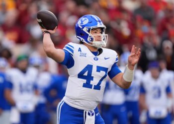 BYU quarterback Bear Bachmeier throws a pass against Iowa State.