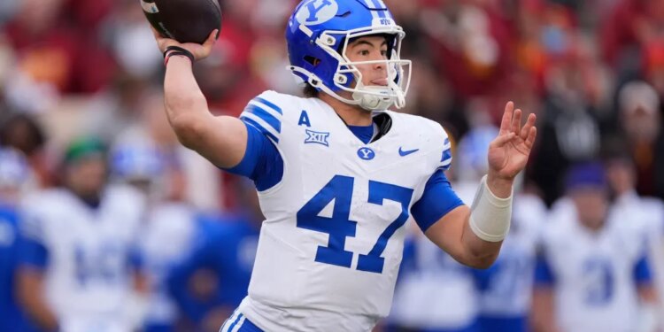 BYU quarterback Bear Bachmeier throws a pass against Iowa State.