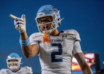Old Dominion wide receiver Tre' Brown III (2) responding to Virginia Tech fans during a college football game.