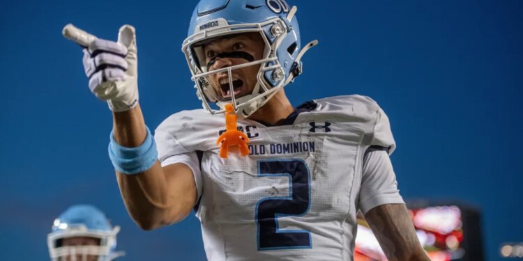 Old Dominion wide receiver Tre' Brown III (2) responding to Virginia Tech fans during a college football game.