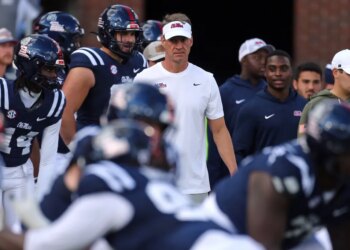Ole Miss head coach Lane Kiffin during warmups.