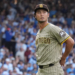 San Diego Padres player Darvish Yu wearing a pinstriped uniform and cap during a game.