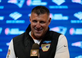 New England Patriots head coach Mike Vrabel speaks at a press conference.