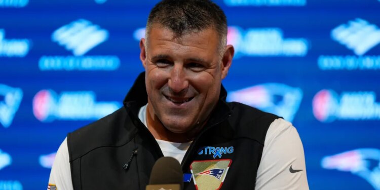 New England Patriots head coach Mike Vrabel speaks at a press conference.