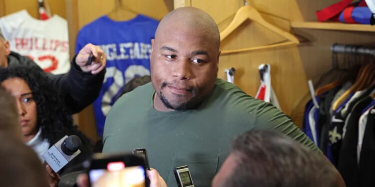 New York Giants defensive tackle Dexter Lawrence II #97, speaking to the media in front of his locker after practice at the New York Giants training facility in East Rutherford, New Jersey.