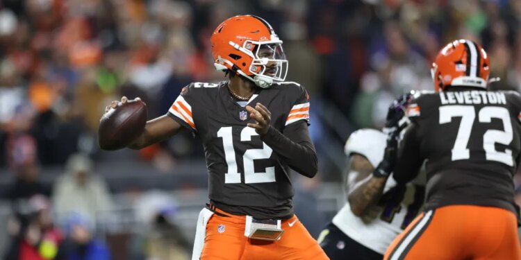 Ceveland Browns quarterback Shedeur Sanders (12) drops back to pass during the third quarter against the Baltimore Ravens at Huntington Bank Field.