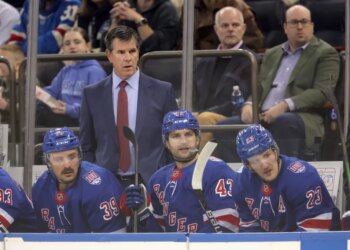 New York Rangers head coach Mike Sullivan coaching players against the Nashville Predators.