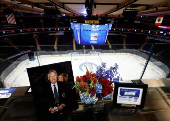 A portrait of Hall of Fame Hockey writer Larry Brooks sits in his desk spot in the press box before the Rangers' game against the Red Wings on Nov. 16, 2025.