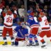 Carolina Hurricanes center Seth Jarvis celebrates a goal with teammate Andrei Svechnikov as New York Rangers goalie Igor Shesterkin and defenseman K'Andre Miller react.