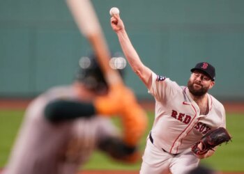 Lucas Giolito delivers in the first inning of a baseball game against the Athletics, Sept. 17, 2025, in Boston.