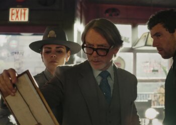 A still photo of Mila Kunis, Daniel Craig, and Josh O’Connor in the film Wake Up Dead Man.