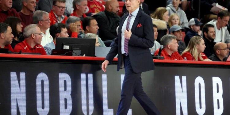 St. John's Red Storm head coach Rick Pitino on the baseline.