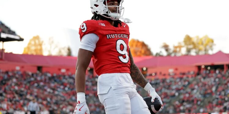 Rutgers wide receiver Ian Strong (9) reacts after scoring a touchdown.