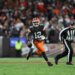 Cleveland Browns quarterback Shedeur Sanders (12) runs with the football during the fourth quarter.
