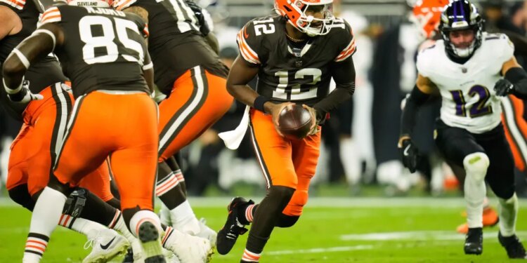 Cleveland Browns quarterback Shedeur Sanders (12) drops back from the line of scrimmage during the second half against the Ravens on Nov. 16, 2025.