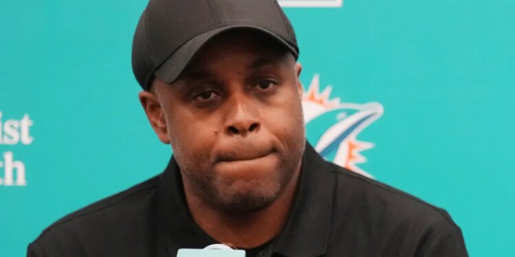 Miami Dolphins general manager Chris Grier at a press conference.