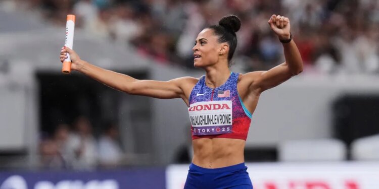United States' Sydney McLaughlin-Levrone celebrates victory in the women's 4 X 400 meters relay.