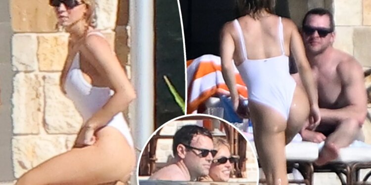 Sydney Sweeney shows off curves in white swimsuit with Scooter Braun