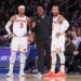 Knicks head coach Mike Brown (M) speaks with New York Knicks guard Josh Hart #3 (L) and New York Knicks guard Jalen Brunson #11 (R) during the third quarter.
