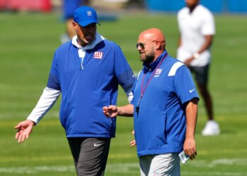 New York Giants offensive coordinator Mike Kafka and head coach Brian Daboll at football practice.