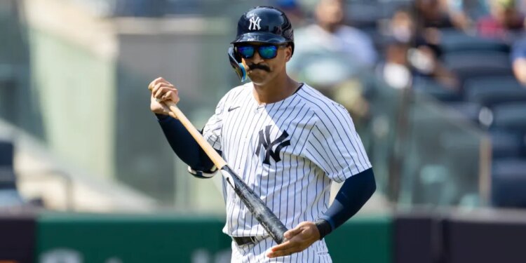 New York Yankees outfielder Trent Grisham (12) reacts as he walks back to the dugout after striking out in the 6th inning against the Houston Astros at Yankee Stadium, Sunday, Aug. 10, 2025, in Bronx, NY.
