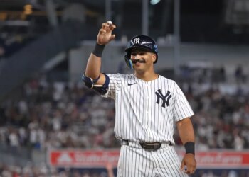 Trent Grisham #12 of the New York Yankees reacts after he hits an RBI single during the 7th inning. 
