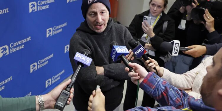 Yankees general manager Brian Cashman talks to the media during the Covenant House Sleep Out event at the Jacob Javits Center in New York on Nov. 20, 2025.