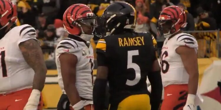 Bengals receiver Ja'Marr Chase (l.) spits at Steelers cornerback Jalen Ramsey (r) on Nov. 16, 2025.