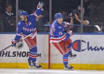 Vincent Trocheck (left) celebrates after a goal by Alexis Lafrenière (right) during the Rangers' win over the Penguins on Nov. 10, 2025.