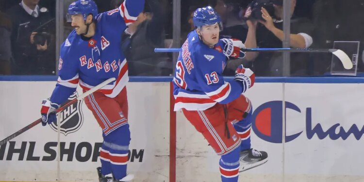 Vincent Trocheck (left) celebrates after a goal by Alexis Lafrenière (right) during the Rangers' win over the Penguins on Nov. 10, 2025.
