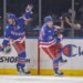 Vincent Trocheck (left) celebrates after a goal by Alexis Lafrenière (right) during the Rangers' win over the Penguins on Nov. 10, 2025.