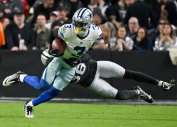 Cowboys wide receiver George Pickens tries to get past Raiders cornerback Kyu Blu Kelly during the second half on Nov. 17, 2025.