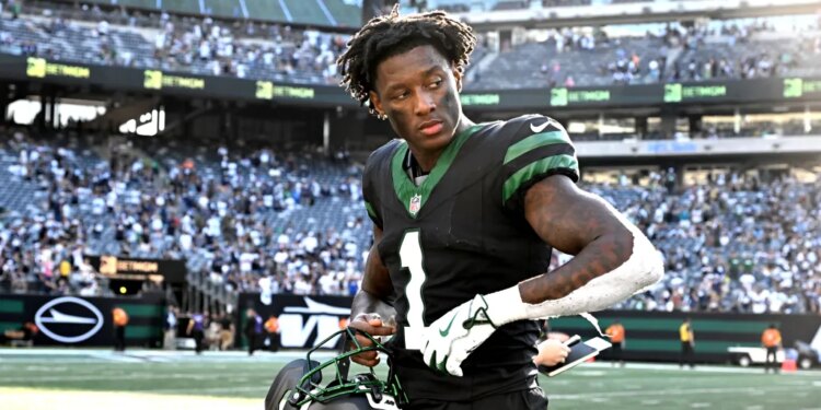 Jets cornerback Sauce Gardner (1) walks off the field after the Dallas Cowboys 37-22 win over the Jets.