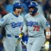Los Angeles Dodgers second baseman Miguel Rojas (72) and two-way player Shohei Ohtani (17) celebrating after scoring in the ninth inning of game seven of the 2025 MLB World Series.
