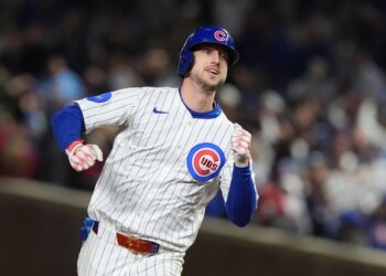 A Chicago Cubs baseball player running.